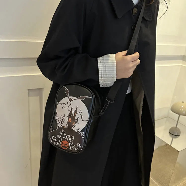 Halloween graffiti print mini crossbody bag with cartoon pumpkin ghost bat design in multiple colours.