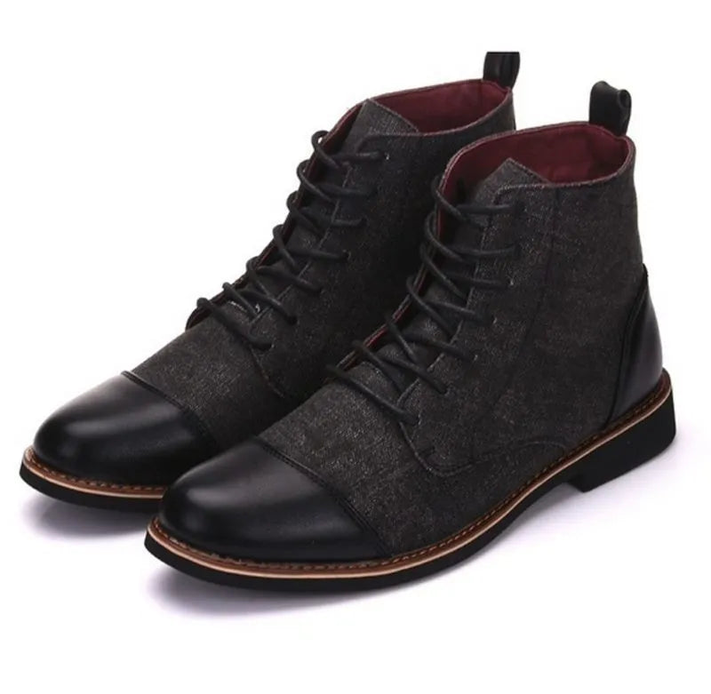 Men's black leather motorcycle boots with silver belt buckle detailing on the shaft.