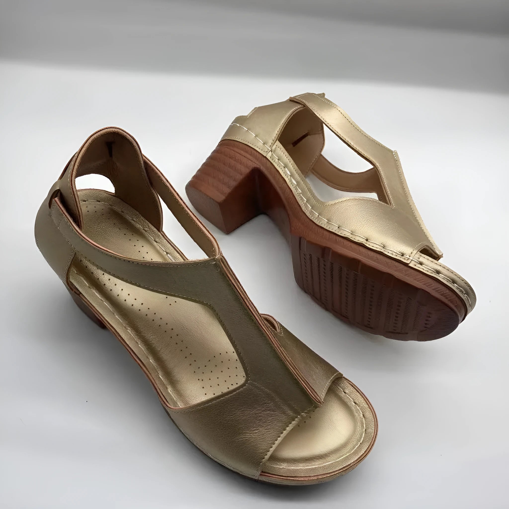 Plus size peep toe wedge sandals with Roman buckle detailing in light brown colour