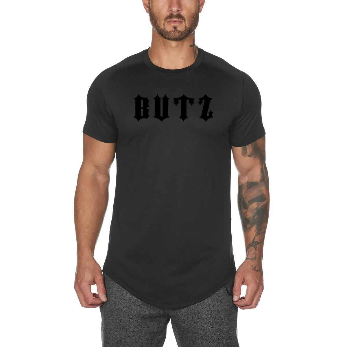 Men's plain custom gym shirt in cotton-spandex blend showing colour and letter print options.