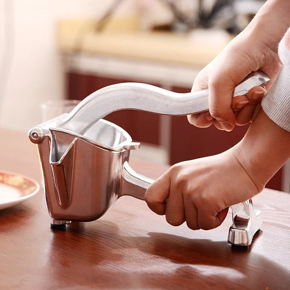 Silver heavy-duty aluminium and steel lemon squeezer press with large bowl.