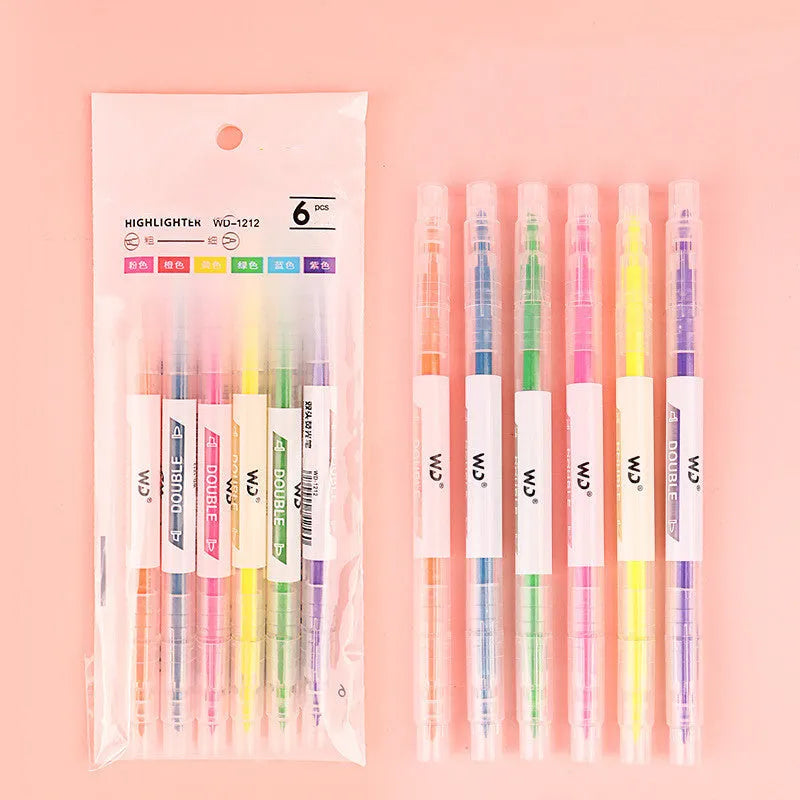 Set of six double-headed marker pens showing round and oblique tips in various colours