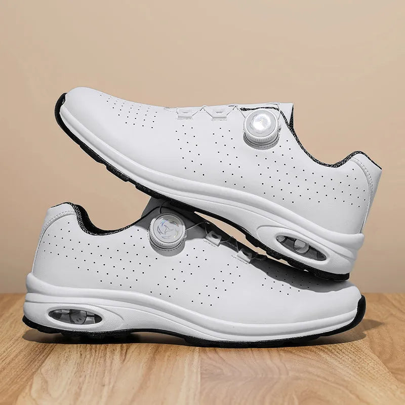 Men's low top black mesh casual shoes with white composite sole and cross shoulder straps.