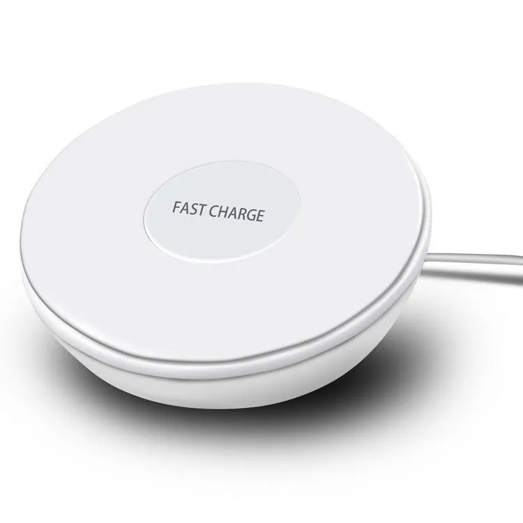 White wireless charging pad with clock display and control buttons for smartphone charging