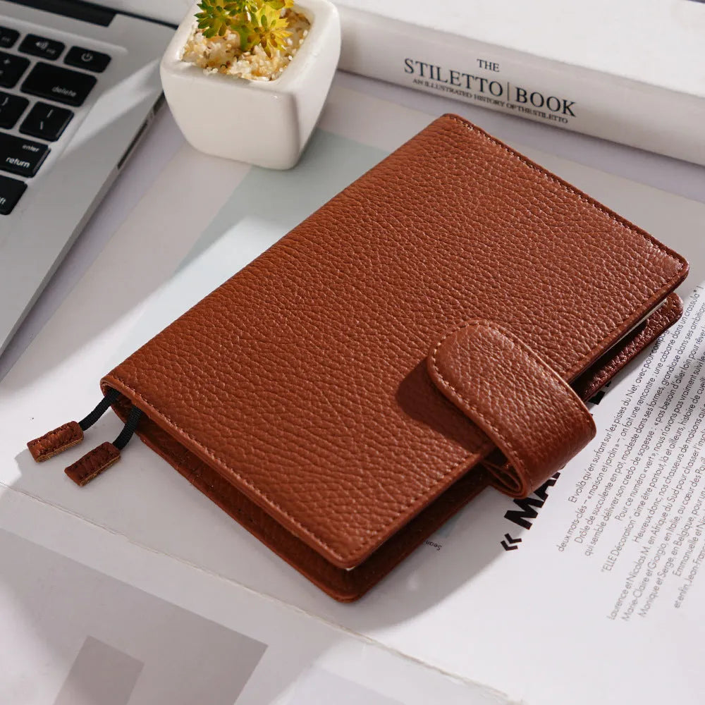 Lychee pattern cowhide leather notebook in A6 size with loose-leaf binding