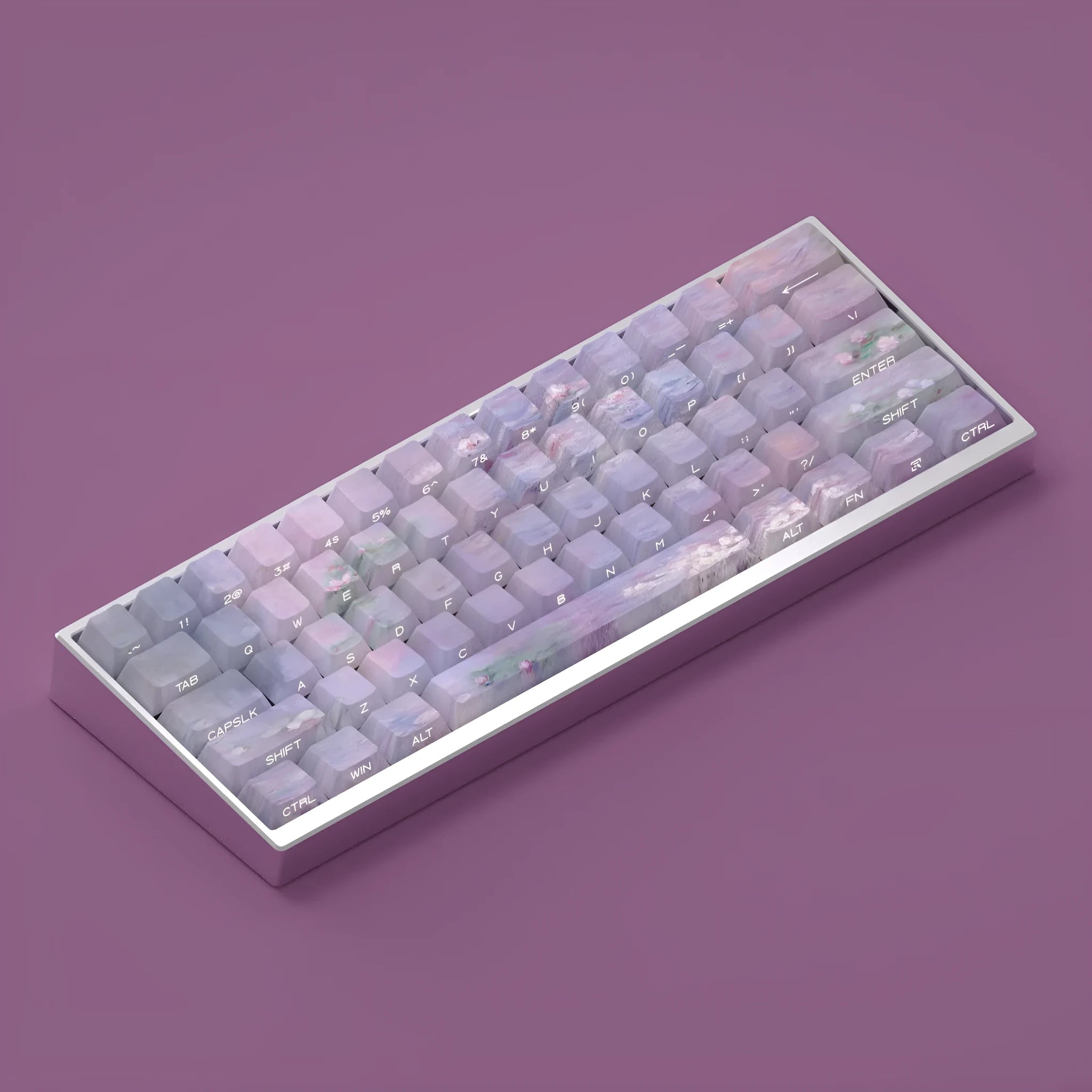 Set of white PBT keycaps with colourful water lily design on top and sides, showing side-engraved transparent characters.
