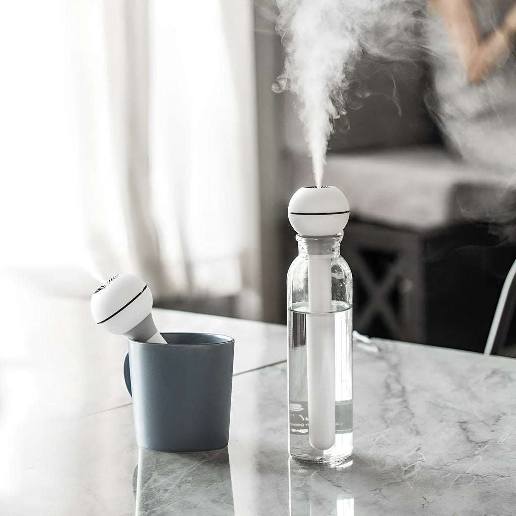 Magic wand ultrasonic humidifier with columnar design in pink and white colour options