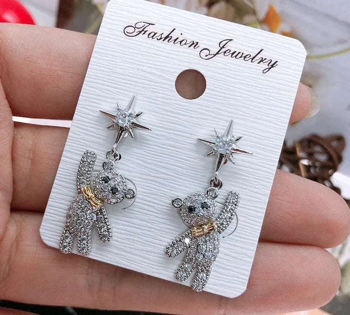 Korean-style star stud earrings for women, diamond finish, gold colour with silver needle post