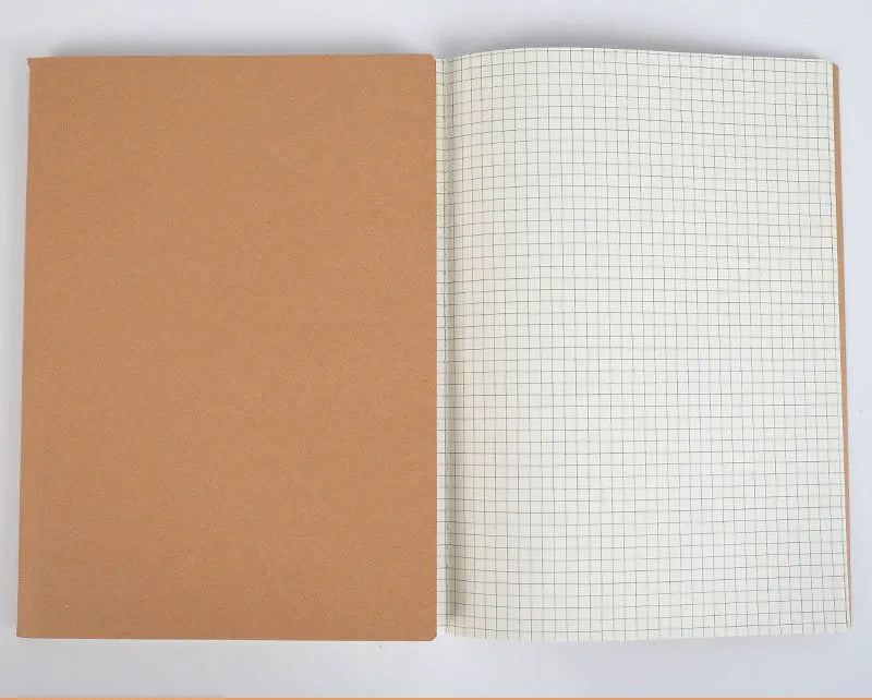 Beige leather thread-bound notebook open showing soft paper with ruled lines.