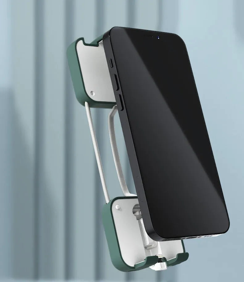 Red portable power bank with an extended bracket holding a mobile phone.