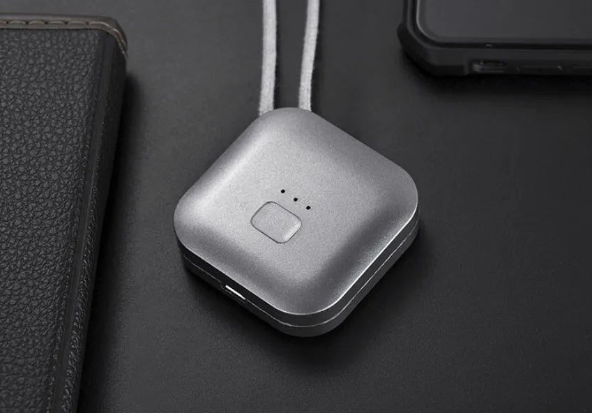 Mini USB rechargeable air purifier necklace in blue, shown with charging cable.
