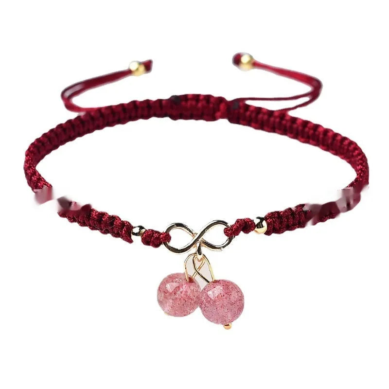 Women's bracelet with a natural strawberry-shaped crystal charm in one of three colour choices.