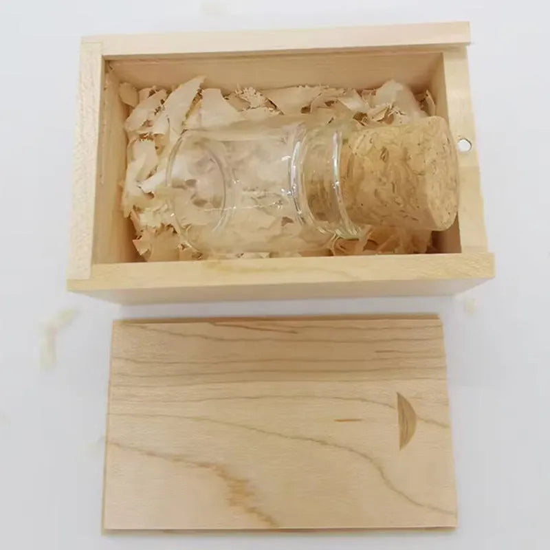 Transparent USB flash drive showing a wooden bottle model inside, dimensions 60mm by 28mm.