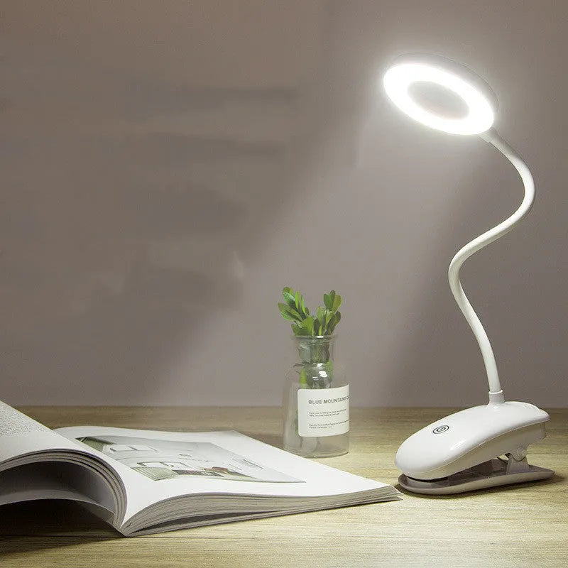 Clip-on rechargeable desk lamp with plastic shade and touch switch in a modern simple design