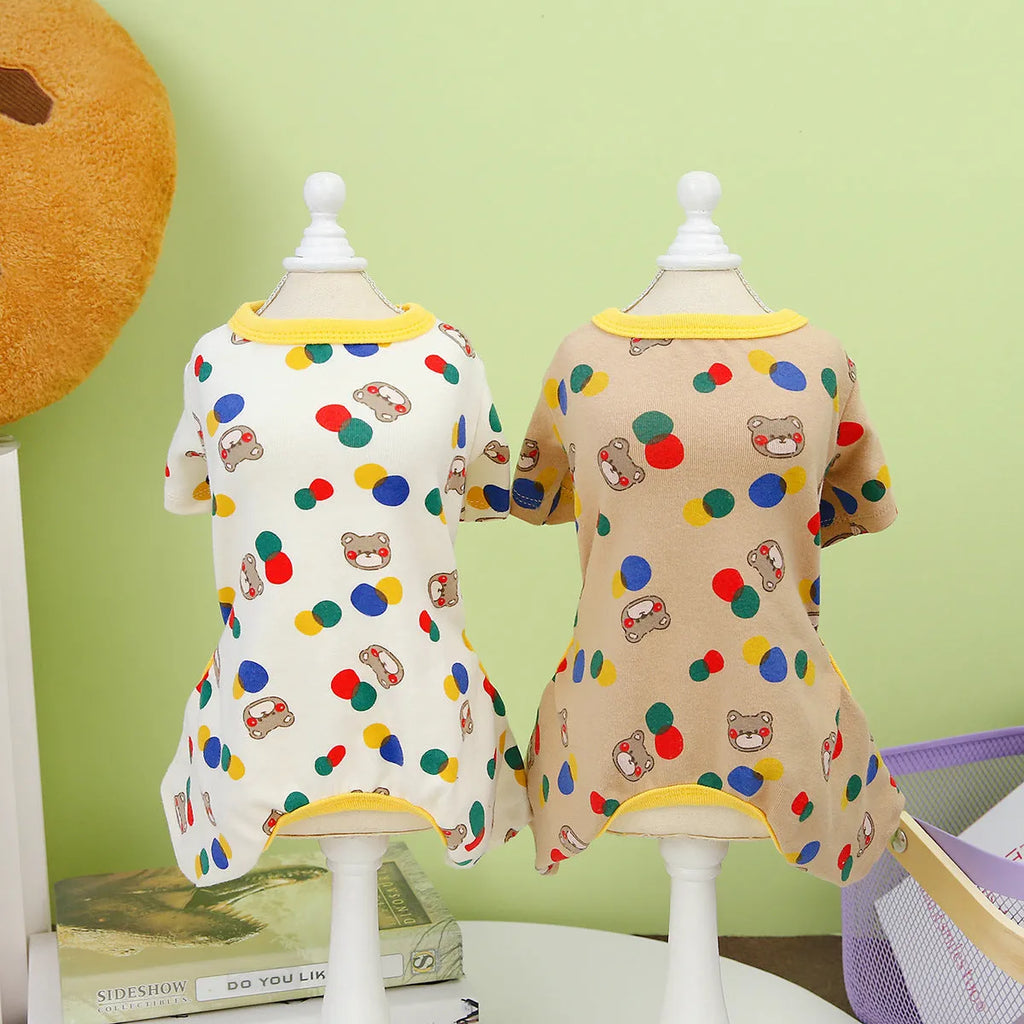 Beige dog t-shirt with a colourful cartoon bear print, showing a casual fit on a pet.