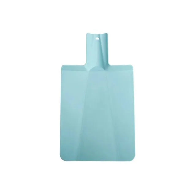 Green folding plastic cutting board with non-slip texture and hanging hole on kitchen countertop