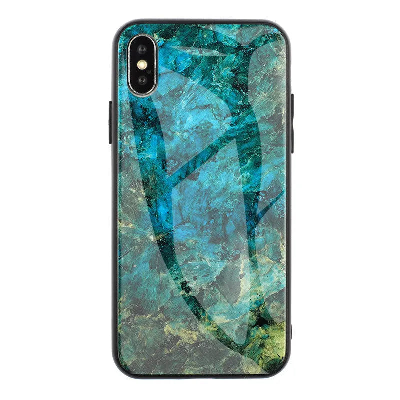 Clear marbled glass design Huawei phone case with cartoon pattern on a table.