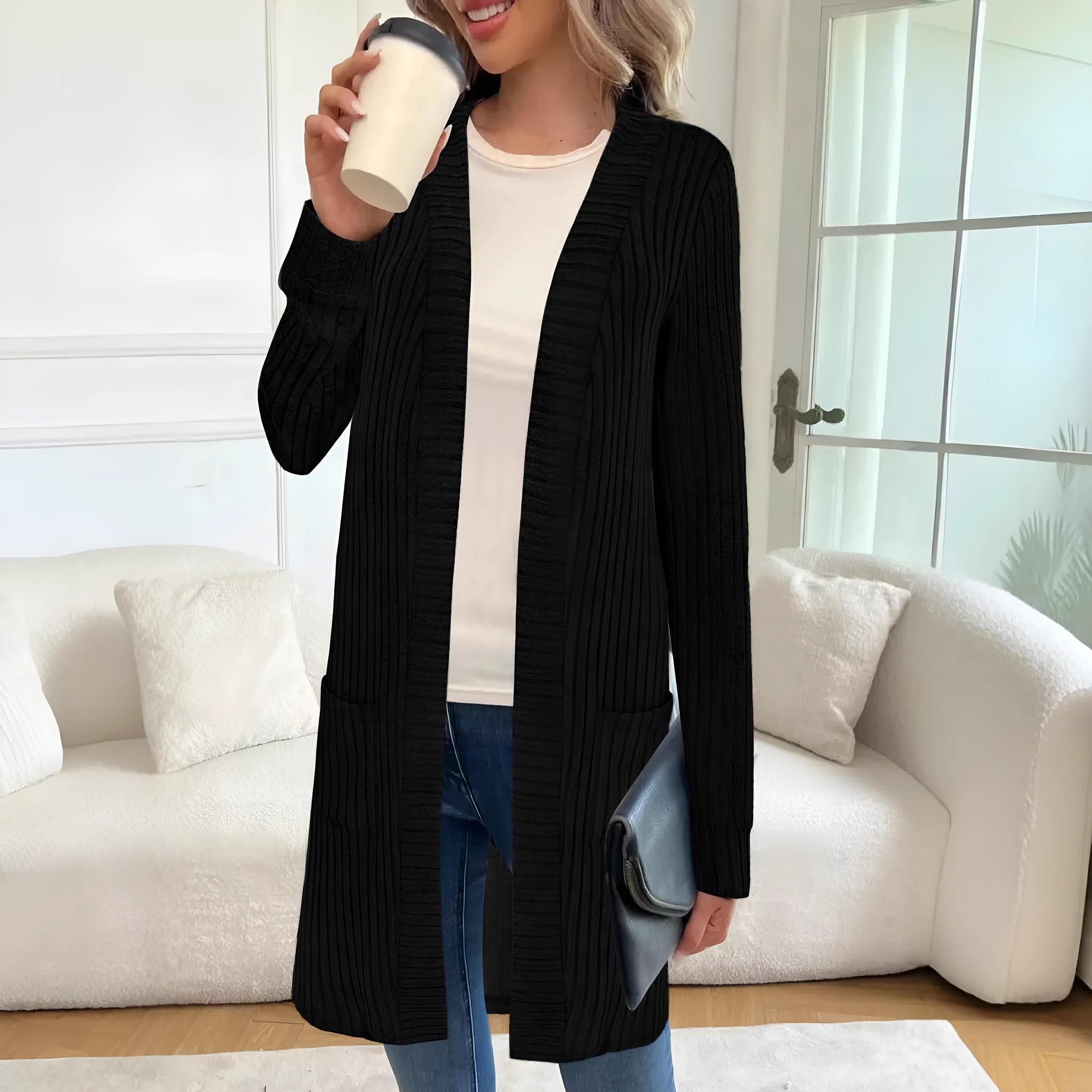 Long sleeve loose fit cardigan jacket with pockets in polyester fabric shown in black colour