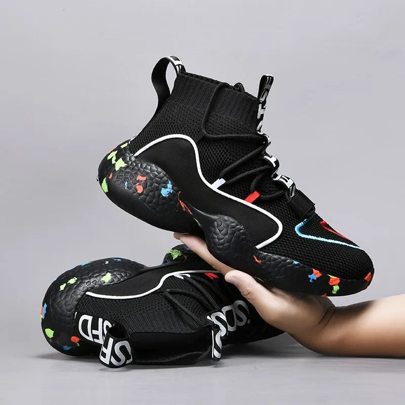 Men's camouflage patterned sneakers with mesh upper and rubber sole on a white background.