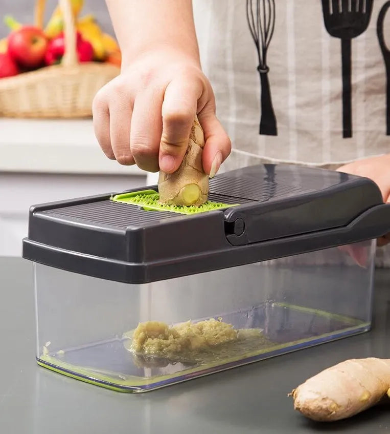 Multifunctional vegetable cutter with seven stainless steel blades on a kitchen counter
