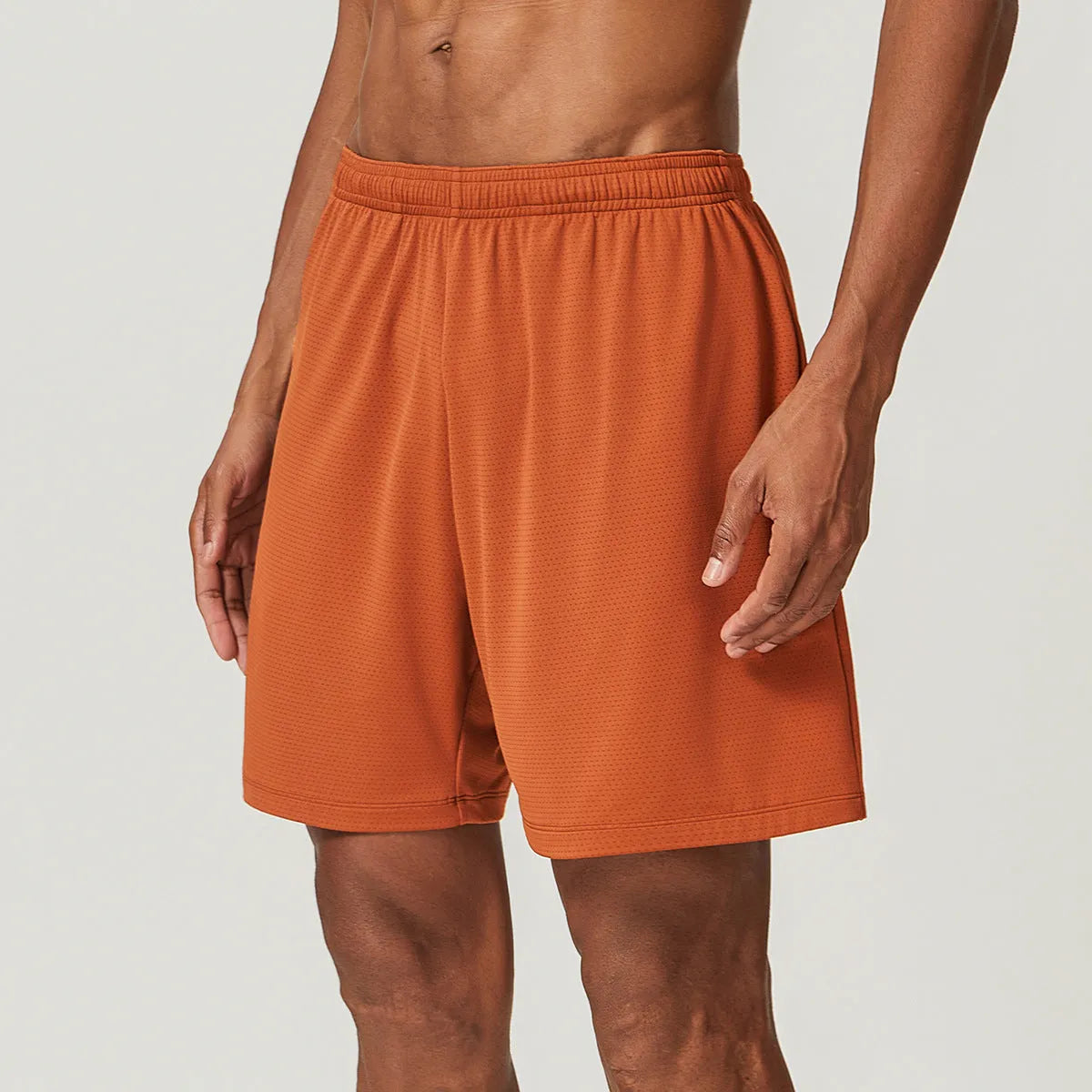 Men's double-layer running shorts in sky green colour on a mannequin, showing mid-waist and shorts length.