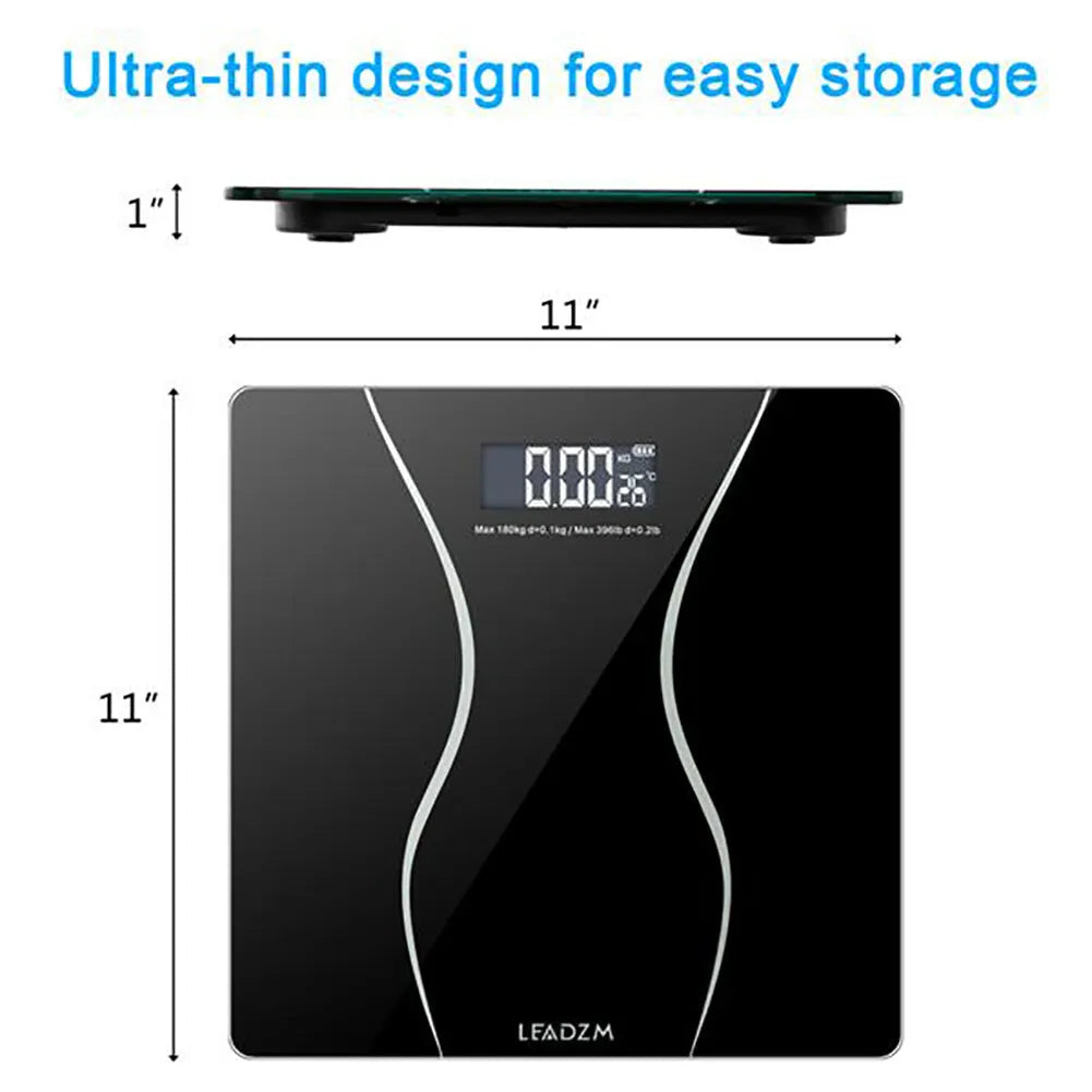 Black electronic household bathroom scale on a floor.