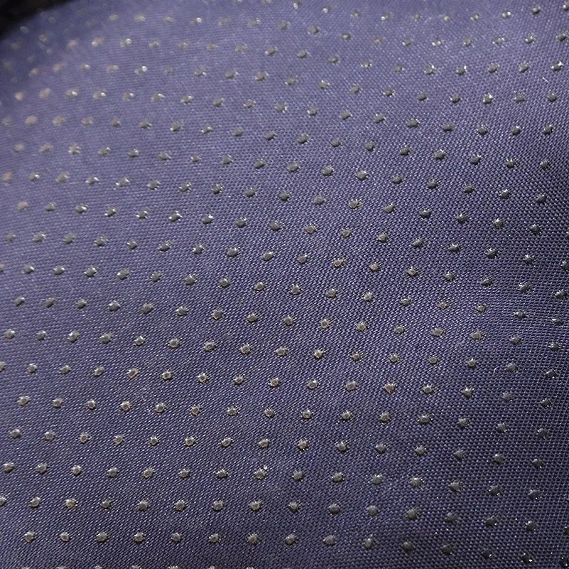 Closed cat nest bed in blue colour with removable cushion shown in home setting