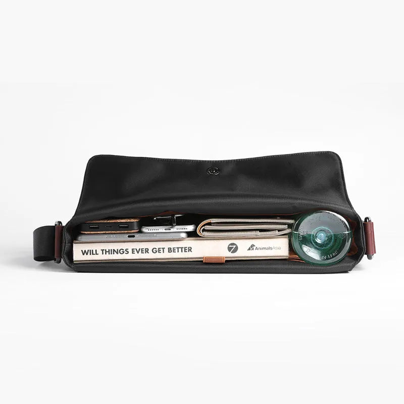 Men's waterproof business tote bag in black, cross-section square shape with zipper closure and soft handles