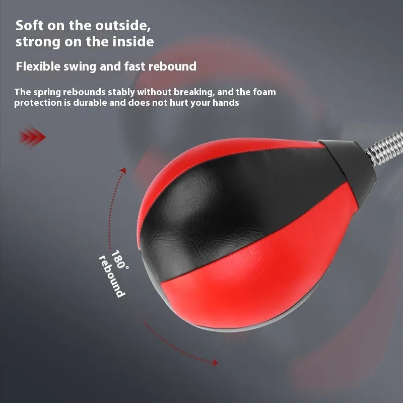 Red and black pear-shaped hanging boxing training ball with elastic cord and suction cup mount.