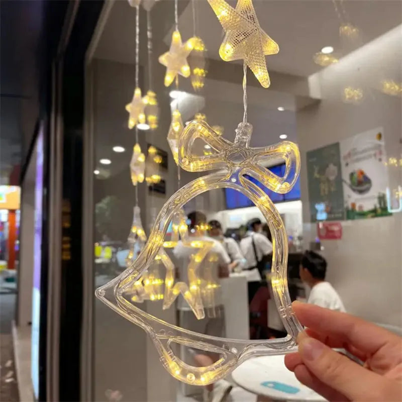 Christmas window lights with star-shaped LED pendants and suction cups for battery-operated festive decoration