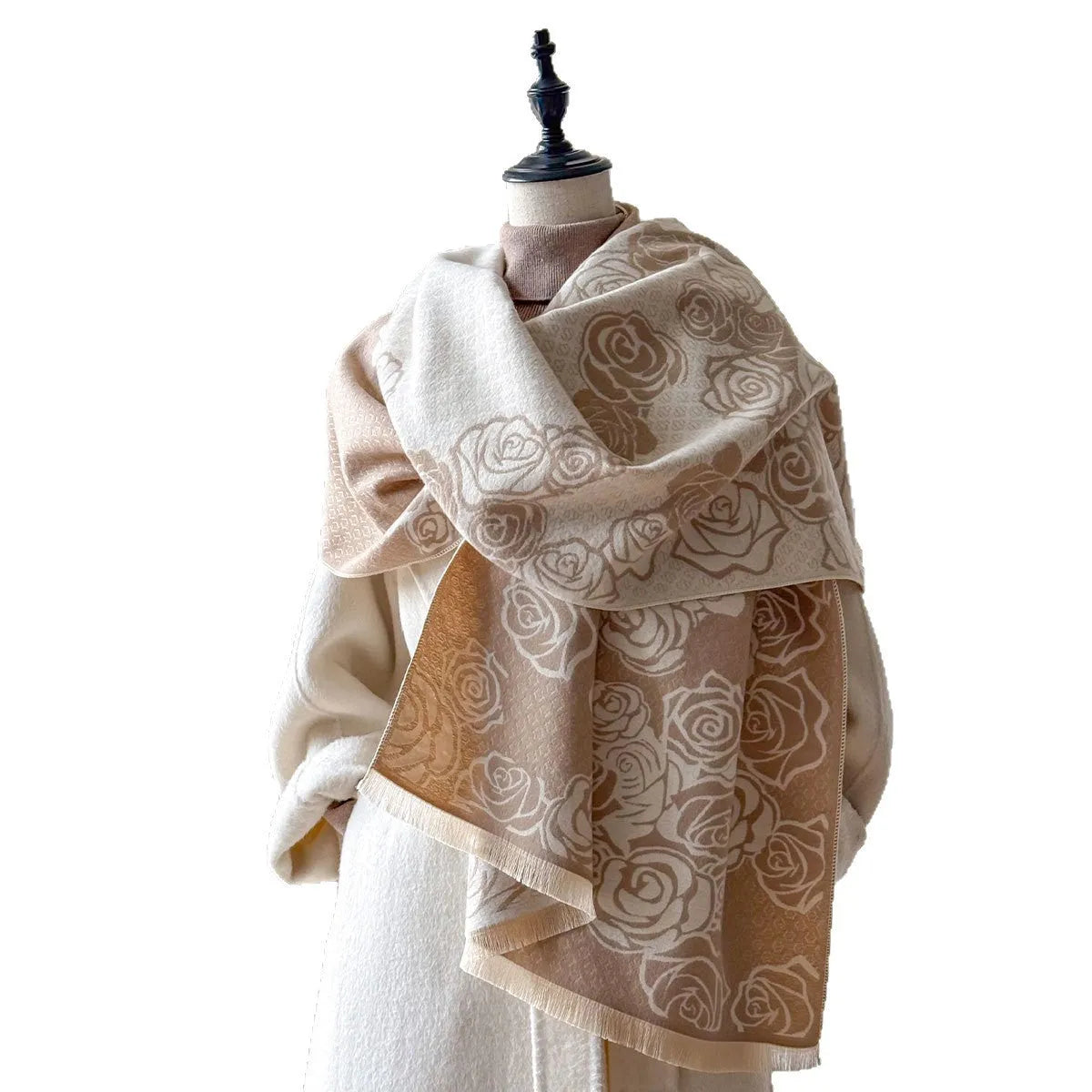 Long grey cashmere-like winter scarf with tassels, shown draped to display its length and texture.