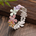 Women's zinc alloy elastic flower bracelet with magnetic clasp in blue floral design