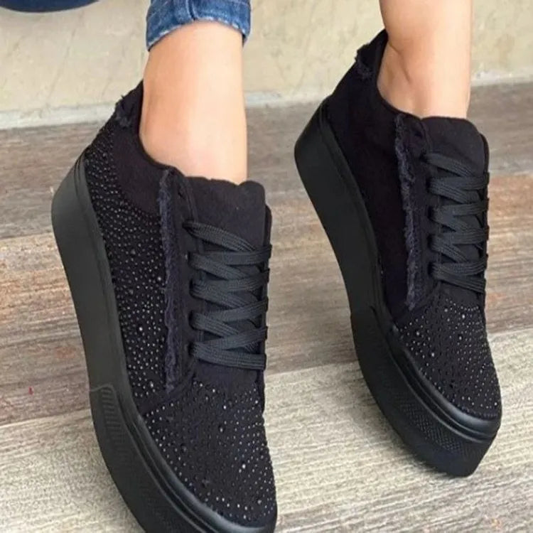 Plus size women's black lace-up casual shoes with rhinestone details and a thick rubber sole.