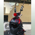 Black crown and long feather motorcycle helmet decoration for personalisation.