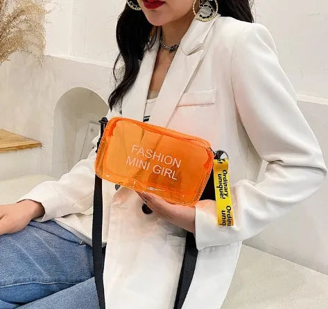 Transparent square jelly shoulder bag in multiple colours with an adjustable long strap.