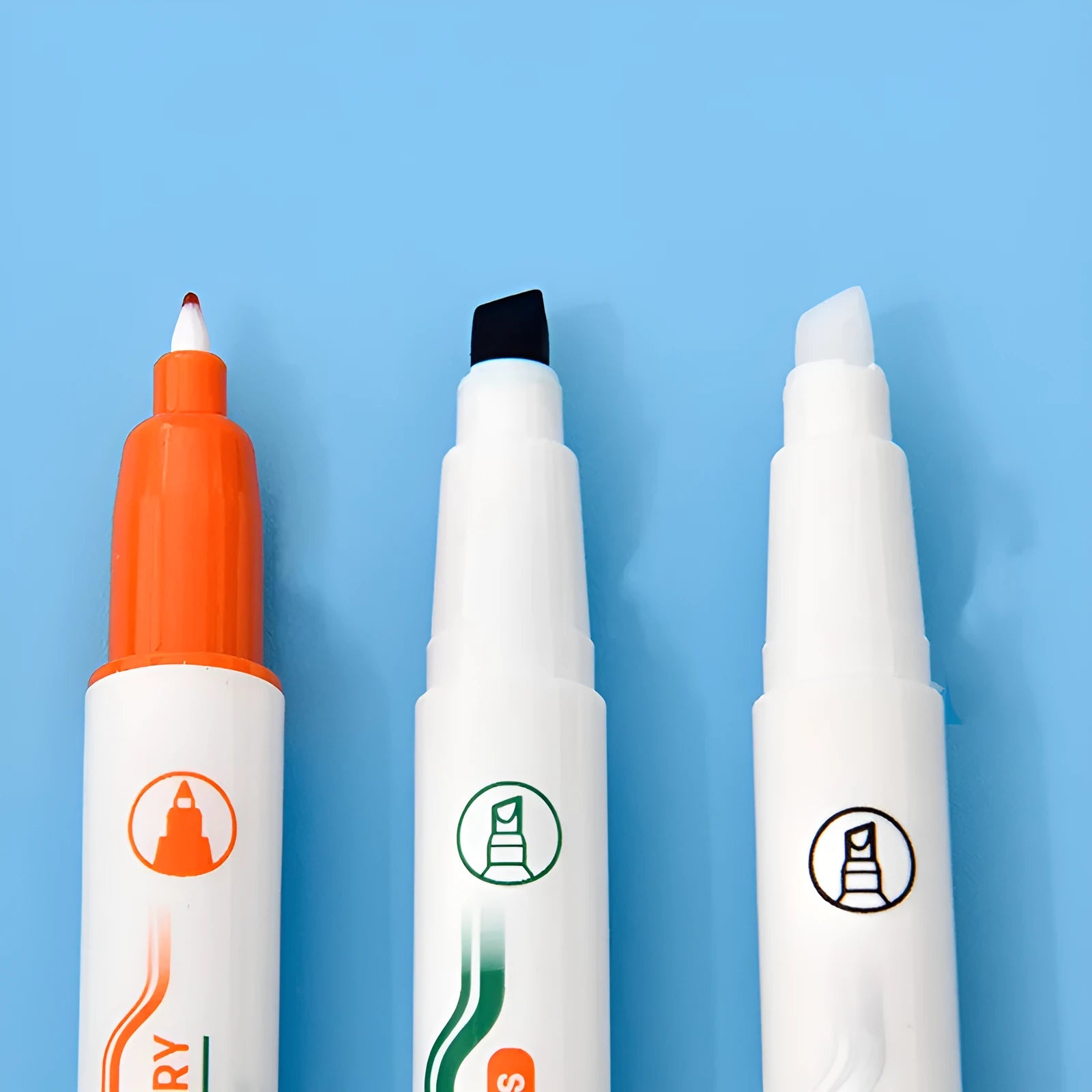 Green erasable highlighter and pen set with slanted design and included eraser on card packaging