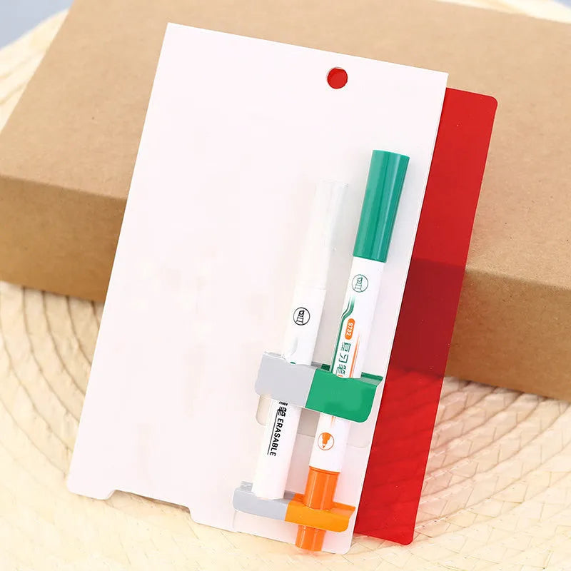 Green erasable highlighter and pen set with slanted design and included eraser on card packaging