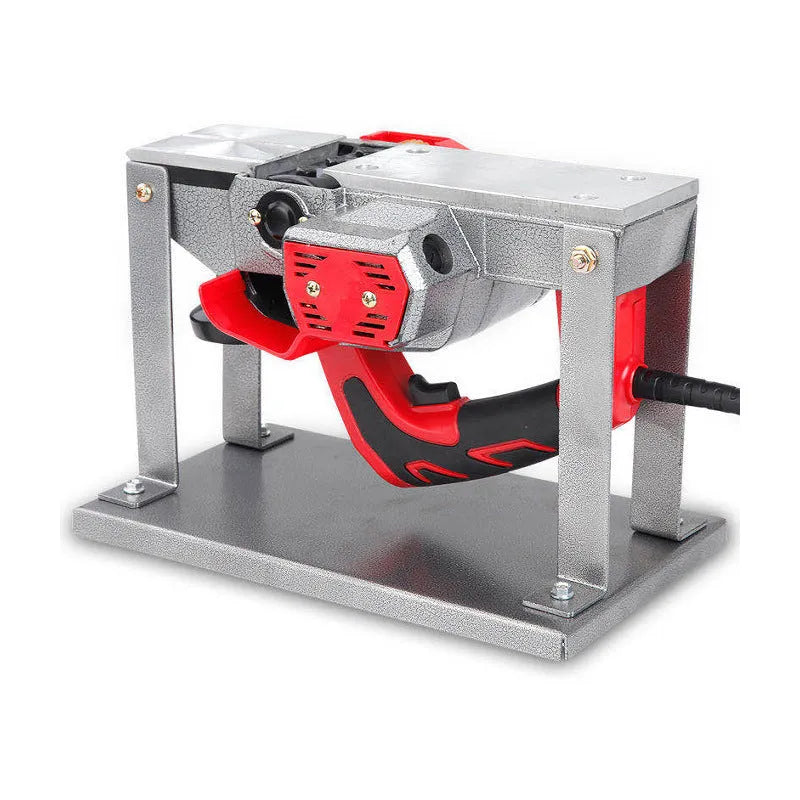 Black iron portable electric planer flip chip bracket accessory on a workbench.
