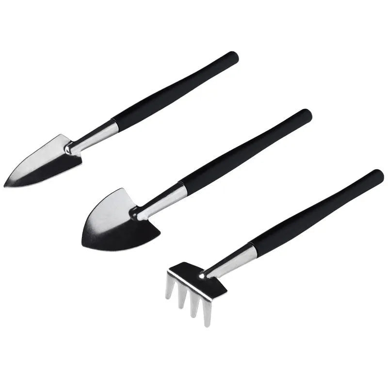 Black plastic and metal succulent gardening tool set with 16 pieces including scissors, shovel, watering bottle, and cushion.
