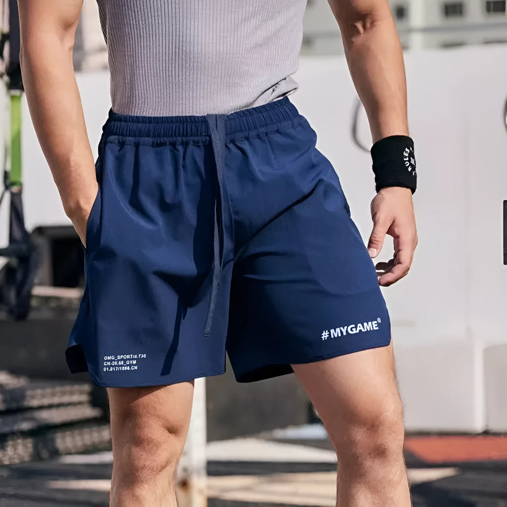 Men's four-point training fitness shorts in Balanced Gray, quick-dry polyester spandex fabric