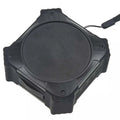 Black waterproof Bluetooth speaker showing compact cube design with control buttons and wrist strap attachment