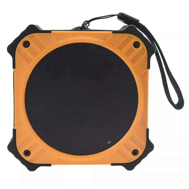 Black waterproof Bluetooth speaker showing compact cube design with control buttons and wrist strap attachment
