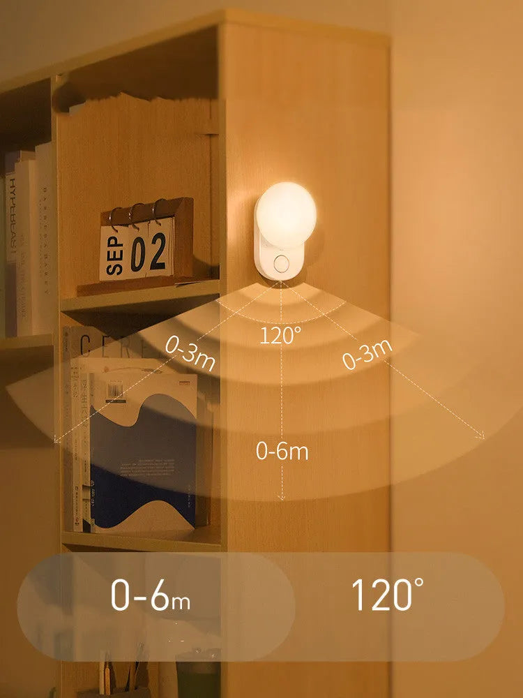 White Baseus rechargeable motion sensor LED night light for bedside or hallway use.