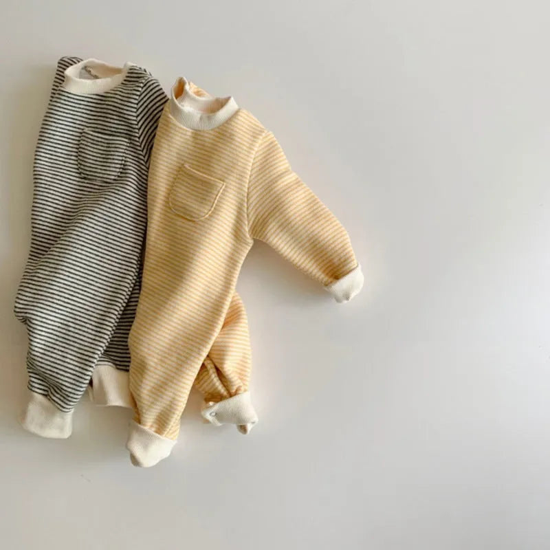Yellow and black striped fleece-lined baby jumpsuit with long sleeves and hidden buttons.