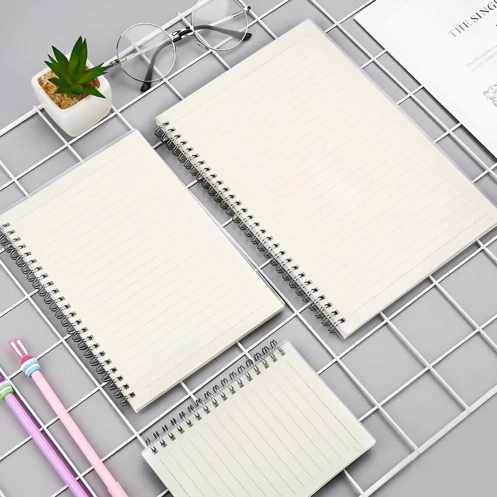 Creative coil notebook open showing grid pages, available in A5, B5, and A6 sizes