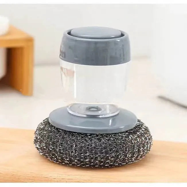 Kitchen palm brush with integrated push-type soap dispenser and bristles for scrubbing.