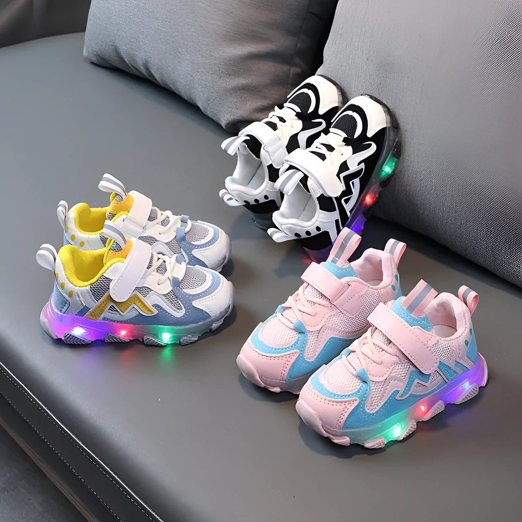 Kids black mesh velcro sneakers with a bright light on the sole, shown on a size chart.