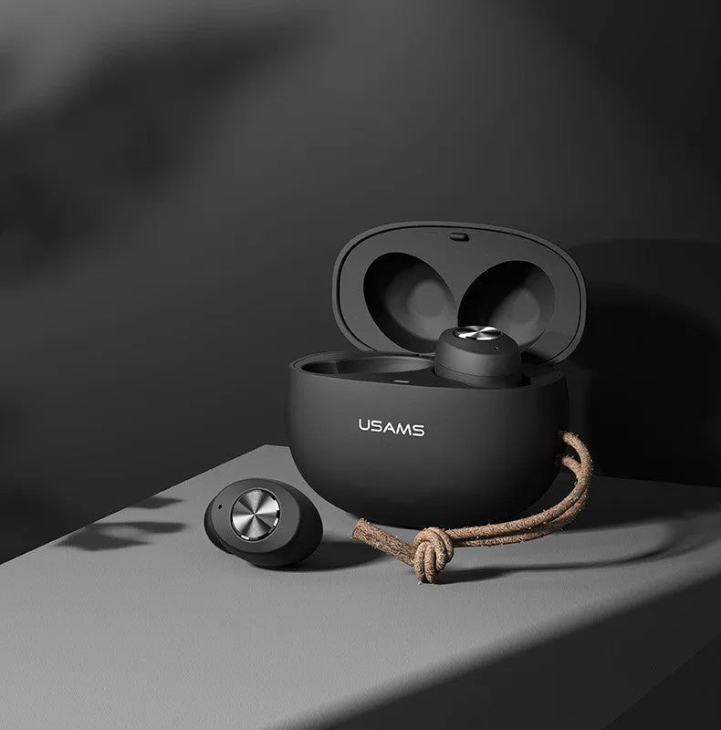 Pebble Series wireless Bluetooth earbuds and charging case in black, white, or dark green.