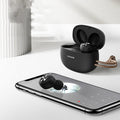 Pebble Series wireless Bluetooth earbuds and charging case in black, white, or dark green.