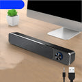 Black and white desktop wired computer speaker with ABS PC enclosure and 2.0 channel audio